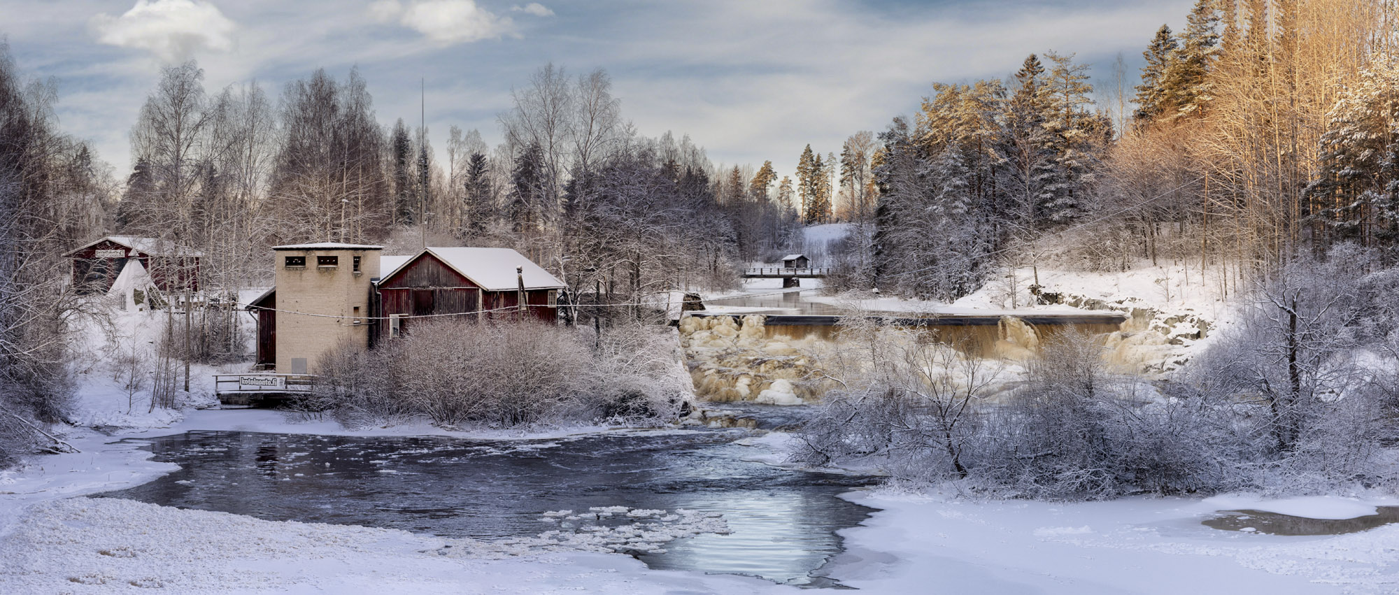 Talvinen jokimaisema Laukkoskella